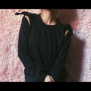 black flowy long sleeve top with bows